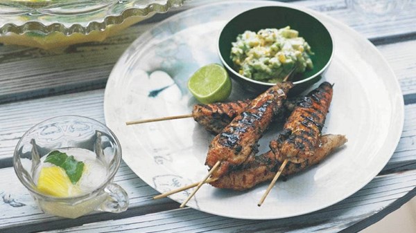Jamaican jerk chicken skewers with avocado corn salsa