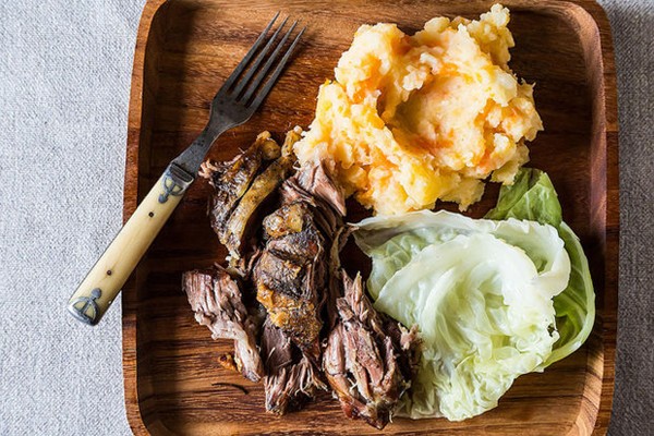 Jamie Oliver's roasted shoulder of lamb with smashed vegetables and greens