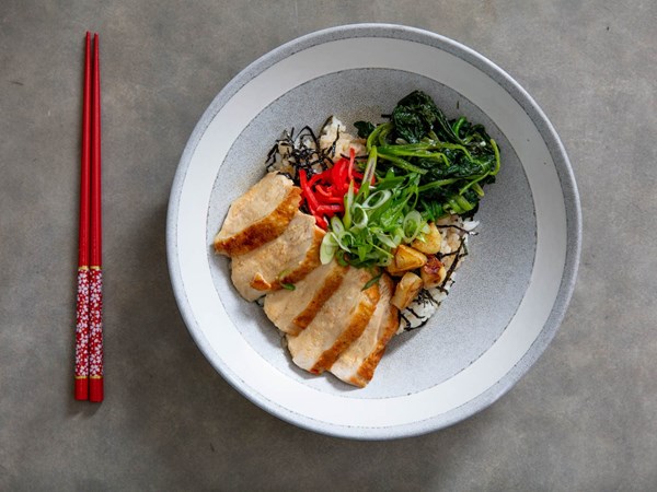 Japanese chicken rice bowl (donburi) with spinach