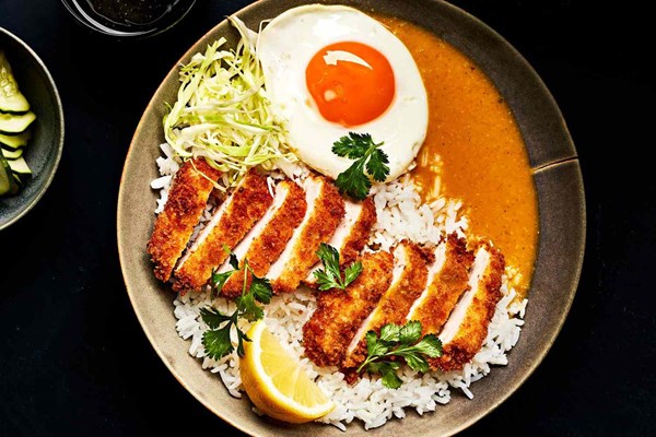 Japanese curry with tonkatsu nuggets and fried egg (Katsu curry)