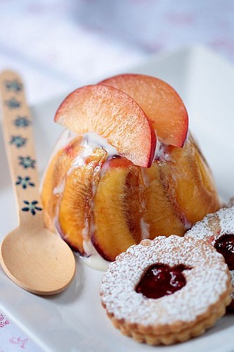 Jasmine tea ice cream in roasted plum cups with Sables Breton cookies