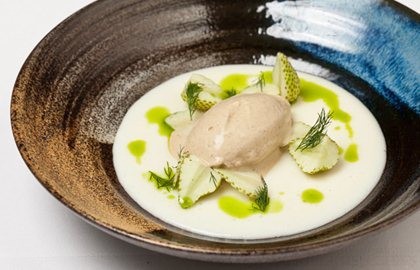 Jellied “koldskaal” and green strawberries, liquorice ice cream and dill