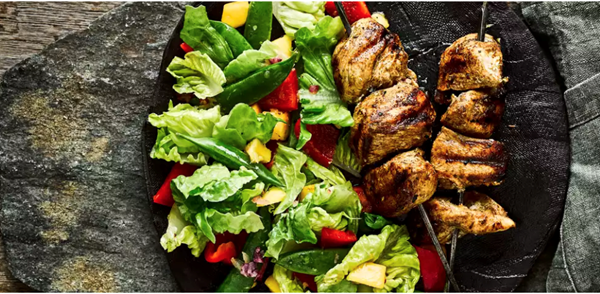 Jerk chicken skewers with mango salad