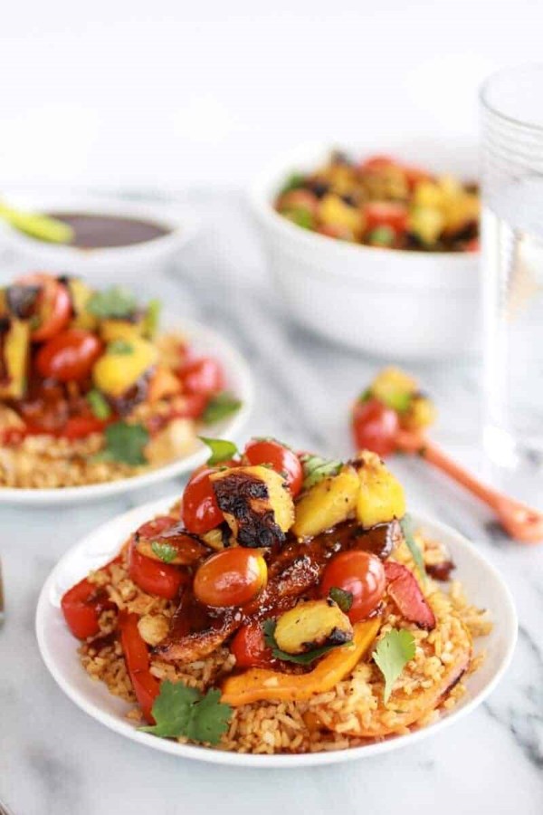 Jerk chicken with fried rice and grilled pineapple salsa