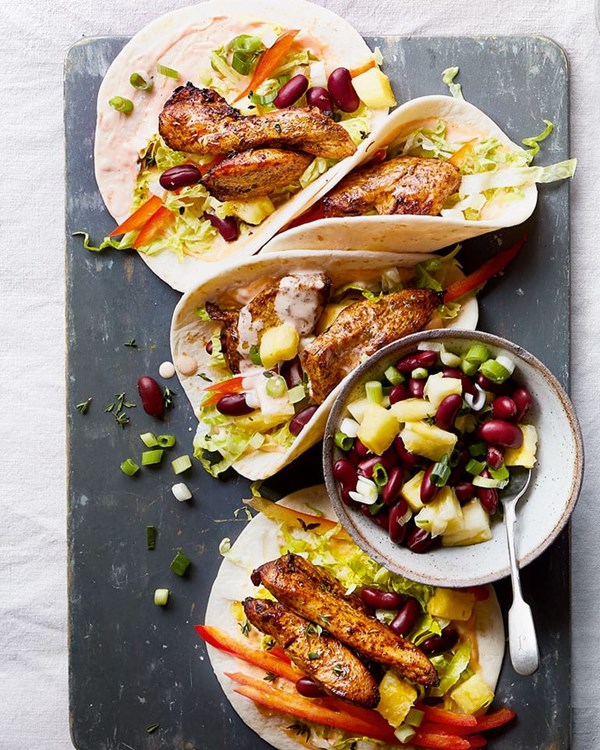Jerk chicken wraps with bean salsa and hot sauce mayo 