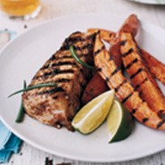 Jerk halibut steak with sweet potato wedges