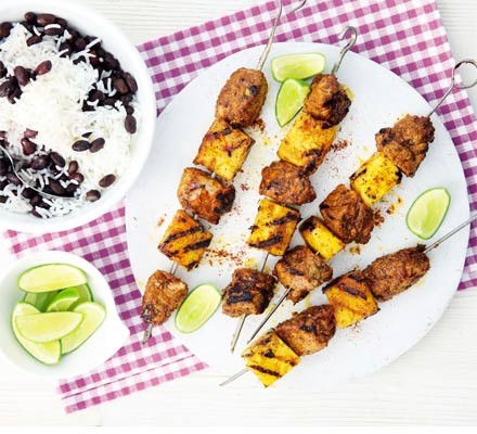 Jerk pork & pineapple skewers with black beans & rice