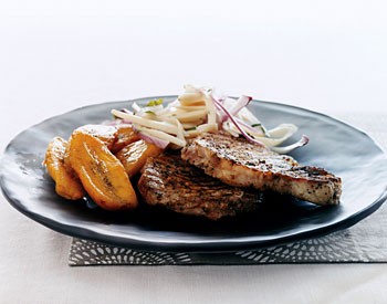 Jerk pork chops with hearts of palm salad and sweet plantains