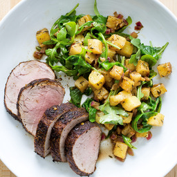 Jerk pork tenderloin with arugula and pineapple salad