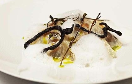 Jersey Royals with onions, milk skin and lovage