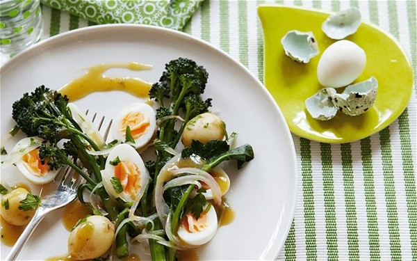 Jersey Royals with purple sprouting broccoli, quail's eggs and anchovy cream