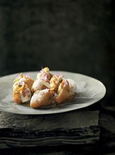 Jerusalem artichokes with toma della rocca and rosemary flowers