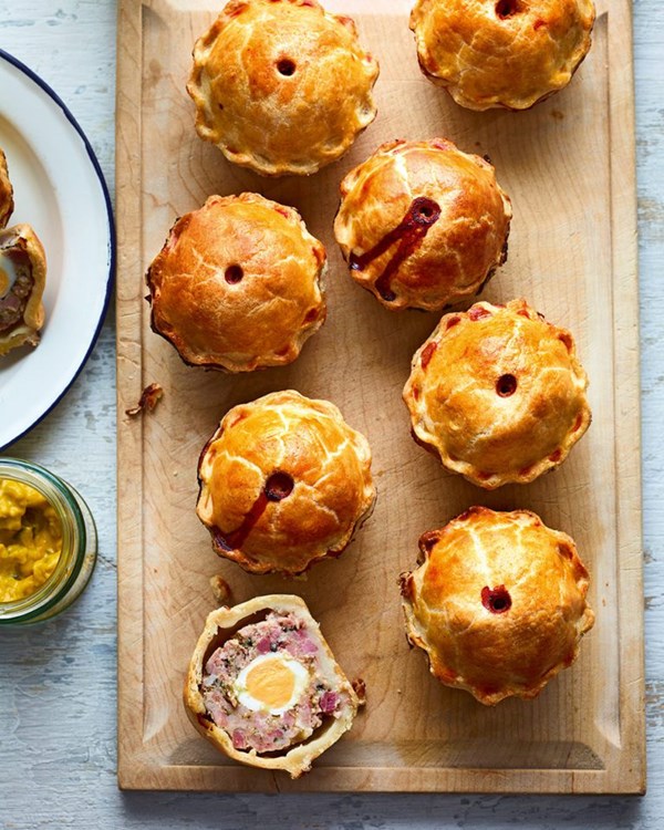 Jubilee pork, ham and quail’s egg mini pies