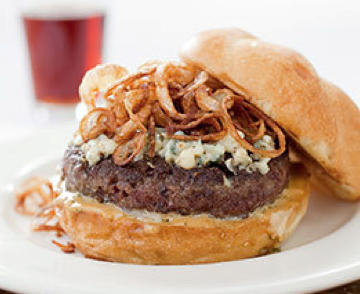 Juicy pub-style burgers with crispy shallots and blue cheese