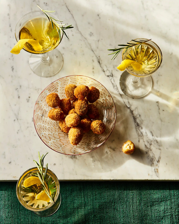Juniper lemon martinis with deep-fried olives