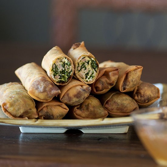 Kale and chicken egg rolls with ginger soy dip