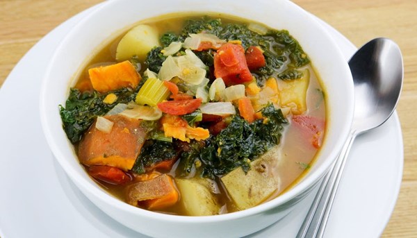 Kale and sweet potato soup with cumin and lemon