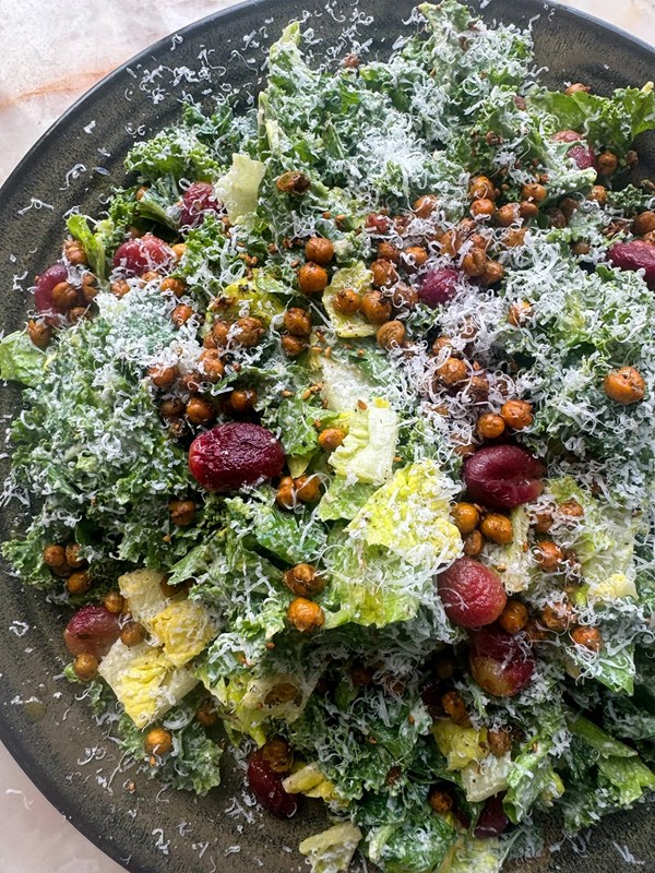 Kale and tahini Caesar with za’atar, chickpeas and roasted grapes