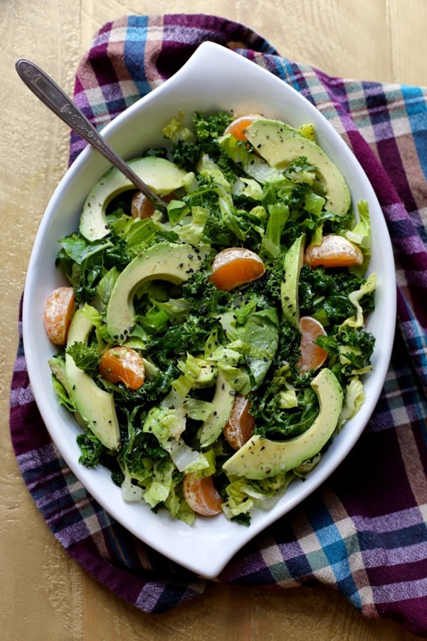 Kale, avocado, tangerine, and sesame salad