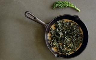 Kale braised in ham stock with cream and brown sugar (Långkål)