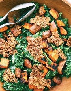 Kale Caesar salad with smoky sweet potatoes and quinoa pumpkin seed croutons