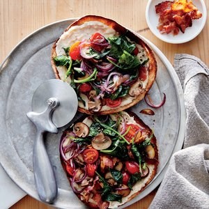 Kale, mushroom, and bacon pita pizzas
