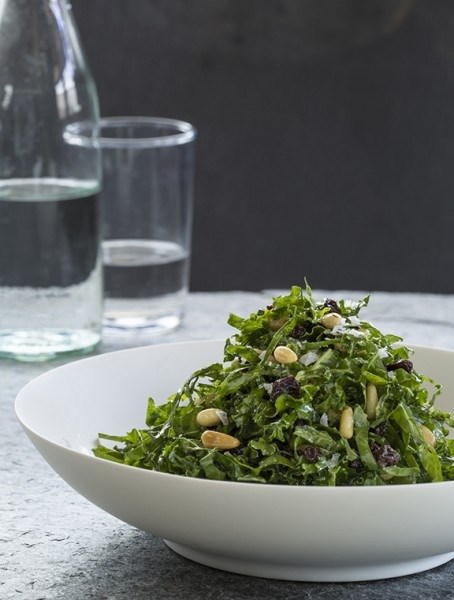Kale salad with currants, pine nuts, and lemon-thyme vinaigrette