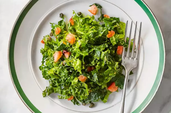 Kale salad with fried capers and golden raisins