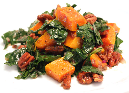 Kale salad with roasted butternut squash and spiced pecans