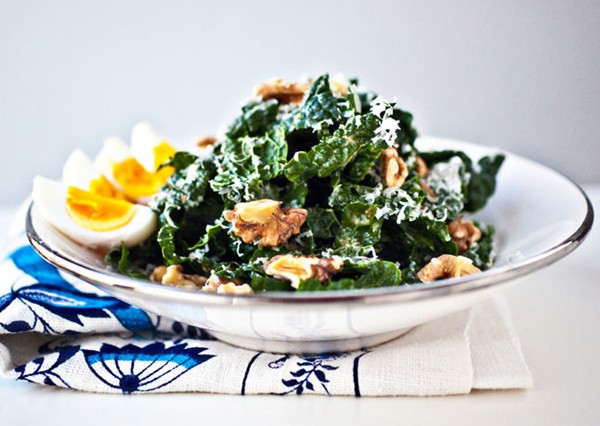 Kale salad with walnuts and soft-boiled eggs