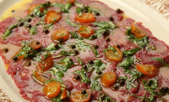 Kangaroo carpaccio with cumquats, green peppercorns and verjuice
