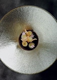 Karasumi with pearl onions, roasted red onion, wasabi and society garlic