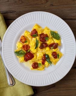 Karya’s ricotta raviolini with melted baby tomato sauce