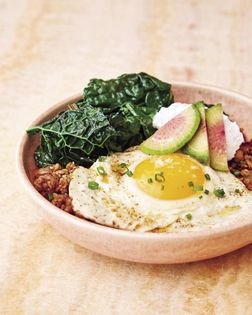 Kasha and kale bowl with berbere spice fried egg