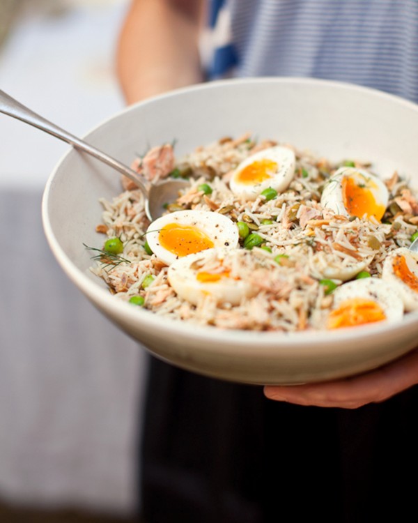 Kedgeree-style poached salmon salad with peas and toasted pepitas (with tangy yoghurt dressing)
