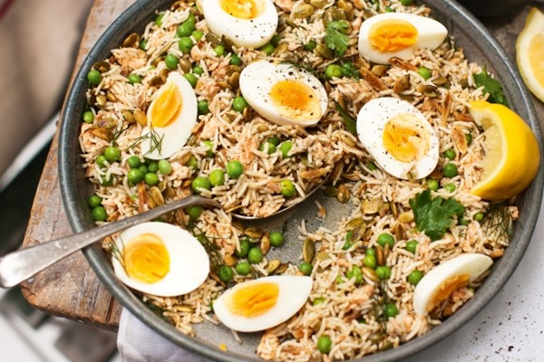 Kedgeree-style poached salmon salad with peas and toasted pepitas