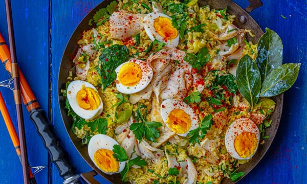 Kedgeree with leeks, wilted spinach, herbs and creme fraiche