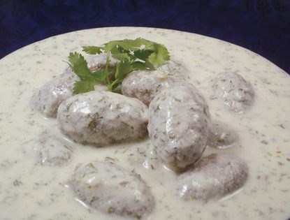 Kibbi balls in cilantro yogurt (Kibbi labaniyeh)
