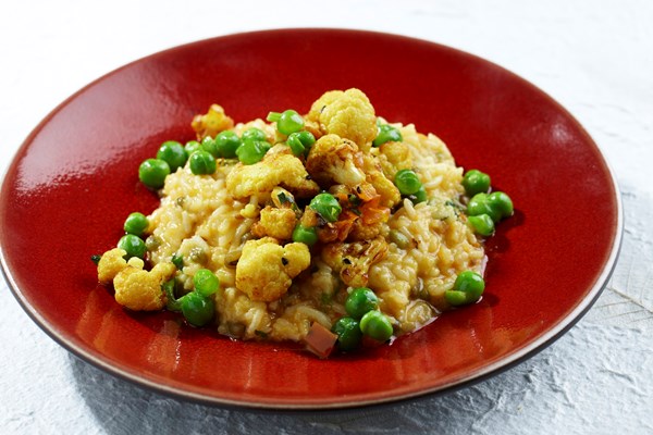 Kichri with pickled cauliflower and peas