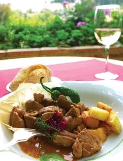 Kid goat in garlic sauce (Cabrito al ajillo)