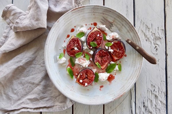  Kidderton Ash goat's cheese with pomegranate molasses-baked figs and mint