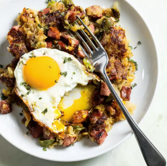 Kielbasa hash with potatoes and fried eggs