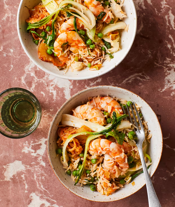 Kimchi fried rice with peas, prawns and pak choi
