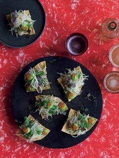 Kingfish sashimi tostada with green papaya and guacamole