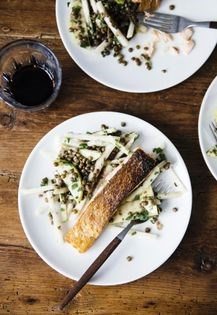 Kohl-slaw with apples, black lentils, sherry vinaigrette, and seared salmon