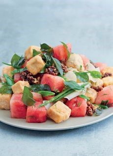 Kohlrabi, watermelon, tofu, mangetout, curry leaves and candied walnuts