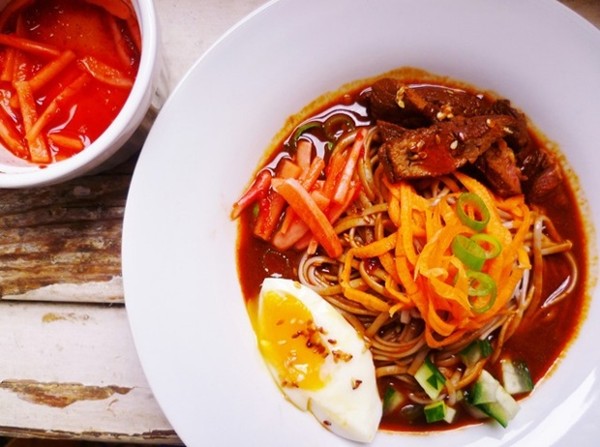 Korean cold buckwheat noodle soup with beef (Naengmyeon)