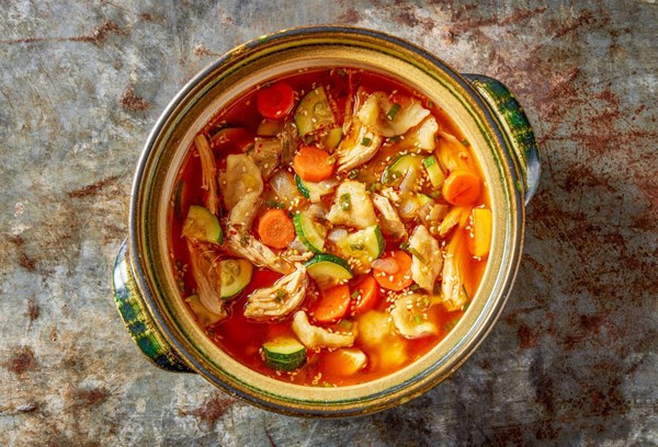 Korean hand-torn noodle soup with chicken (Sujebi)