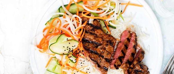 Korean steak with pickled cucumber salad
