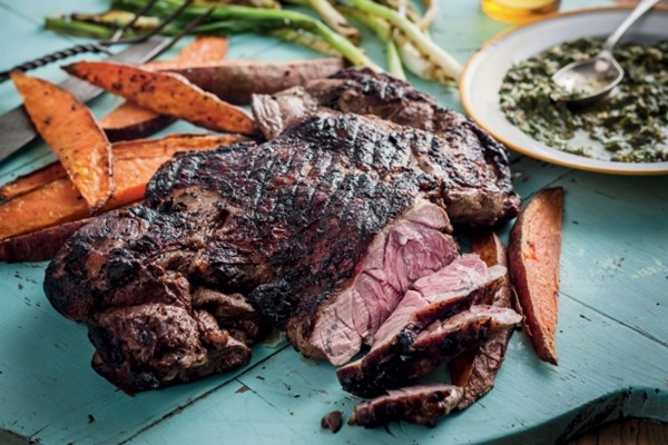 Lamb al asador with chimichurri and kumara wedges